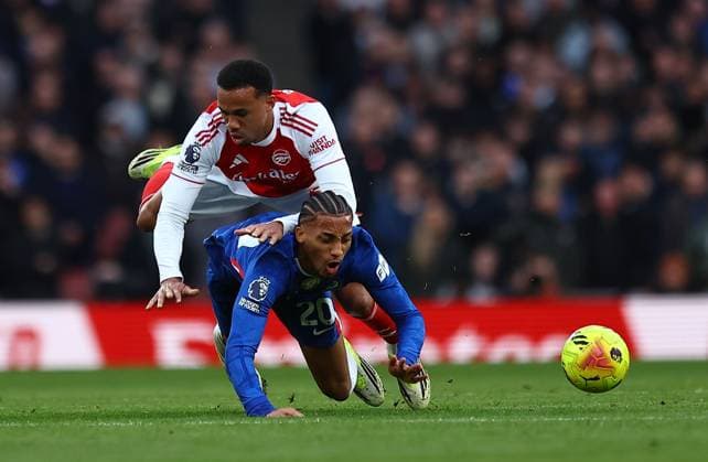 Joao Pedro of Chelsea competes for the ball with Gabriel Magalhaes of Arsenal Arsenal v Chelsea, Premier League, Football, Emirates Stadium, London, UK - 01 Mar 2026London Emirates Stadium United Kingdom EDITORIAL USE ONLY No use with unauthorised audio, video, data, fixture lists, club league logos or live services. Online in-match use limited to 120 images, no video emulation. No use in betting, games or single club league player publications. Copyright: xMichaelxZemanek Shutterstockx 16708844as