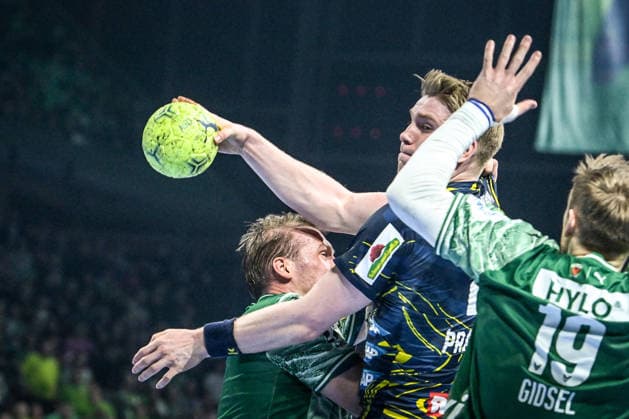 01.03.2026, xlakx, Handball Daikin HBL, Fuechse Berlin - Rhein-Neckar Löwen v.l. Max Darj (Fuechse Berlin), Haukur Thrastarson (Rhein-Neckar Loewen), Mathias Gidsel (Fuechse Berlin) Zweikampf, Duell, Kampf, tackle Berlin