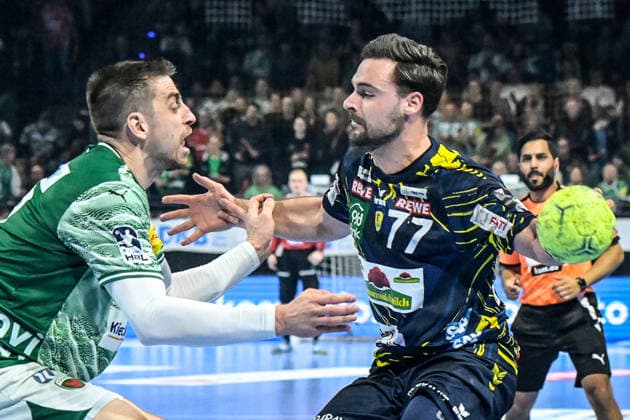 01.03.2026, xlakx, Handball Daikin HBL, Fuechse Berlin - Rhein-Neckar Löwen v.l. Nejc Cehte (Fuechse Berlin), Dani Baijens (Rhein-Neckar Loewen) Zweikampf, Duell, Kampf, tackle Berlin