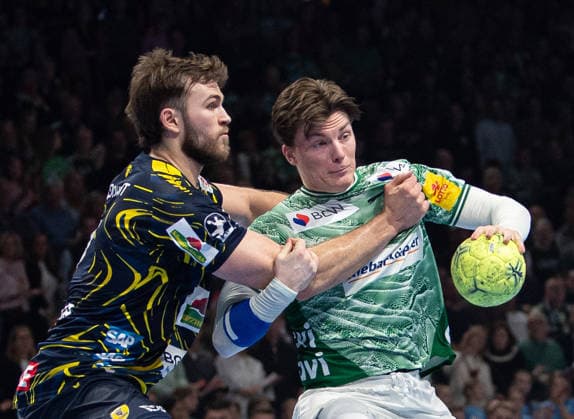 Handball, Herren, Saison 2025 2026, DAIKIN Handball-Bundesliga (23. Spieltag), Füchse Berlin - Rhein-Neckar Löwen, v.l. Steven Plucnar Jacobsen (Löwen), Nils Lichtlein (Füchse Berlin), 01.03.2026, Copyright: xSebastianxRäppold MatthiasxKochx
