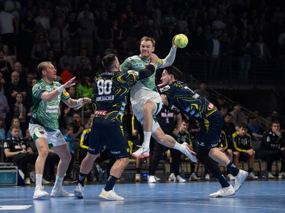 Handball, Herren, Saison 2025 2026, DAIKIN Handball-Bundesliga (23. Spieltag), Füchse Berlin - Rhein-Neckar Löwen, v.l. Max Darj (Füchse Berlin), Jannik Kohlbacher (Löwen), Mathias Gidsel (Füchse Berlin), Robert Timmermeister (Löwen), 01.03.2026, Copyright: xSebastianxRäppold MatthiasxKochx