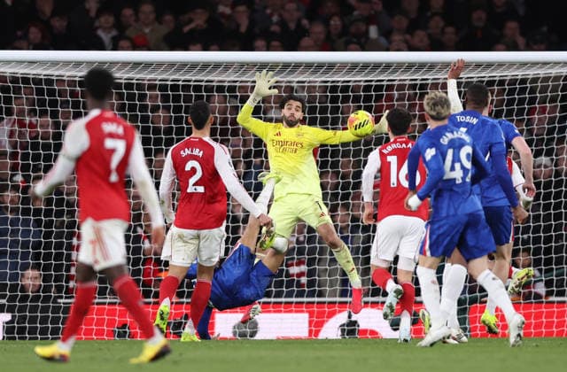London, England, 1st March 2026. David Raya of Arsenal makes another save to keep them in the game from Joao Pedro of Chelsea during the Arsenal vs Chelsea Premier League match at the Emirates Stadium, London. Picture credit should read: David Klein Sportimage EDITORIAL USE ONLY. No use with unauthorised audio, video, data, fixture lists, club league logos or live services. Online in-match use limited to 120 images, no video emulation. No use in betting, games or single club league player publications. SPI_106_DK_Arsenal_Chelsea SPI-4568-0105