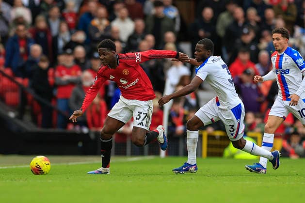 Manchester United, ManU v Crystal Palace, Premier League Kobbie Mainoo (37) of Manchester United tries to run clear of Tyrick Mitchell (3) of Crystal Palace during the Premier League match between Manchester United and Crystal Palace at Old Trafford, Manchester, UK on 1 March 2026. Manchester Old Trafford Greater Manchester UK Editorial use only DataCo restrictions apply See www.football-dataco.com , Copyright: xConorxMolloyx PSI-23823-0113