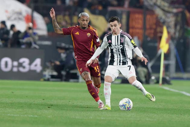 Italy: Serie a football match AS Roma vs Juventus Roma™s Brazilian defender Wesley challenges for the ball with juventus Portuguese forward Francisco Conceicao during the Serie A football match between AS Roma vs Juventus at the Olimpico Stadium in Rome, Italy on March 01, 2026. _BPH6717 Copyright: xAntonioxBalascox