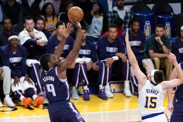 March 1, 2026, Los Angeles, California, USA: Sacramento KingsÃ¢â‚¬â ¢ Precious Achiuwa (9) shoots against Los Angeles LakersÃ¢â‚¬â ¢ Austin Reaves (15) during an NBA, Basketball Herren, USA basketball game at Crypto.com Arena on Sunday, March 1, 2026 in Los Angeles. NBA 2026: Kings Vs Lakers  - ZUMAc68_ 20260301_zaf_c68_017 Copyright: xRingoxChiux