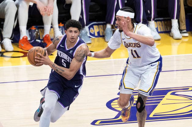 March 1, 2026, Los Angeles, California, USA: Sacramento KingsÃ¢â‚¬â ¢ Nique Clifford (5) drives against Los Angeles LakersÃ¢â‚¬â ¢ Jaxson Hayes (11) during an NBA, Basketball Herren, USA basketball game at Crypto.com Arena on Sunday, March 1, 2026 in Los Angeles. NBA 2026: Kings Vs Lakers  - ZUMAc68_ 20260301_zaf_c68_022 Copyright: xRingoxChiux