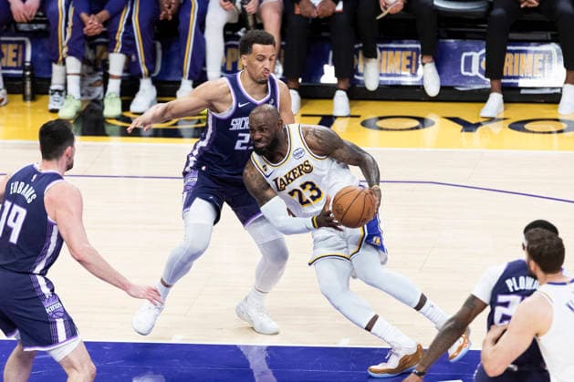 March 1, 2026, Los Angeles, California, USA: Los Angeles LakersÃ¢â‚¬â ¢ LeBron James (23) drives against Sacramento KingsÃ¢â‚¬â ¢ Patrick Baldwin Jr. (23) during an NBA, Basketball Herren, USA basketball game at Crypto.com Arena on Sunday, March 1, 2026 in Los Angeles. Los Angeles USA - ZUMAc68_ 20260301_zaf_c68_025 Copyright: xRingoxChiux