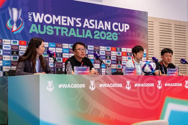 Ri Song-Ho (DPR Korea Head Coach) and Chae Un-Yong (20 DPR Korea) look on during the AFC Womens Asian Cup 2026 MD-1 press conference, PK, Pressekonferenz ahead of Group B game between DPR Korea and Uzbekistan at Western Sydney Stadium in Sydney, Australia. Copyright: xNoexLlamasx xSPPx Sportspressphoto_SPR99756