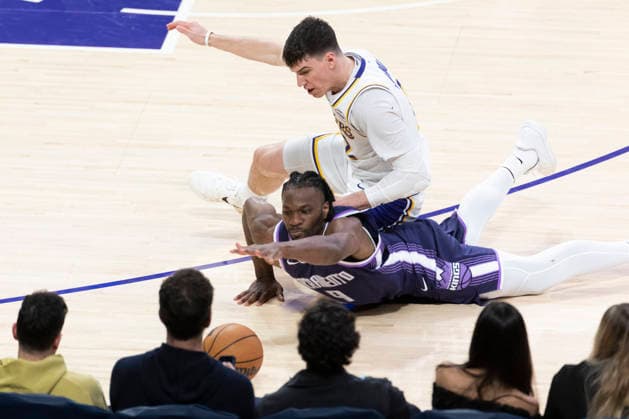 March 1, 2026, Los Angeles, California, USA: Los Angeles LakersÃ¢â‚¬â ¢ Jake LaRavia (12) and Sacramento KingsÃ¢â‚¬â ¢ Precious Achiuwa (9) vie for the ball during an NBA, Basketball Herren, USA basketball game at Crypto.com Arena on Sunday, March 1, 2026 in Los Angeles. NBA 2026: Lakers 128 : 104 Kings  - ZUMAc68_ 20260301_zaf_c68_056 Copyright: xRingoxChiux