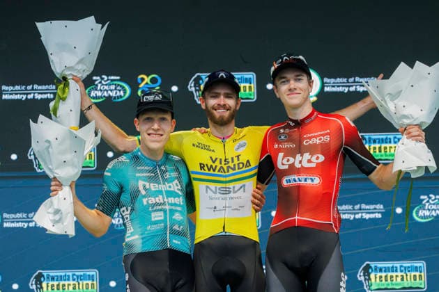 (260302) -- KIGALI, March 2, 2026 -- First-placed Moritz Kretschy of NSN Development Team (C), second-placed Johannes Adamietz (L) of Rembe Rad-net and third-placed Duarte Marivoet of Lotto-Groupe Wanty pose during the awarding ceremony for general classification of the Tour du Rwanda 2026 in Kigali, Rwanda, March 1,2026. (Photo by Xinhua) (SP)RWANDA-KIGALI-CYCLING-TOUR DU RWANDA 2026 CyrilxNdegeya 