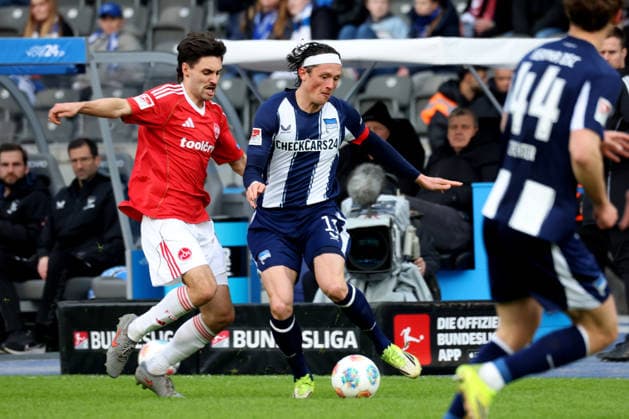DEU, DFL, 2. FBL, Hertha BSC vs. 1.FC Nuernberg, 01.03.2026, Berliner Olympiastadion, Berlin, DEU, DFL, 2. FBL, Hertha BSC vs. 1.FC Nuernberg, im Bild Fabian Reese (Hertha BSC Berlin 11), TOM BAACK (1.FC Nuernberg 5) DFL - regulations prohibit any use of Photographs as image sequences and or quasi-video