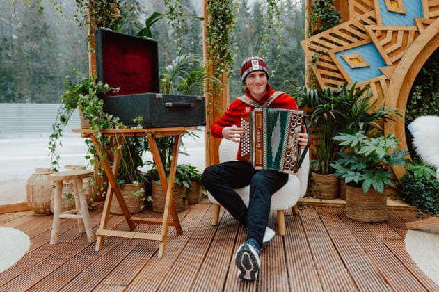 PARALYMPICS - Winter Paralympics Milano Cortina 2026 CORTINA D AMPEZZO,ITALY,02.MAR.26 - PARALYMPICS - Paralympic Winter games, Winterspiele,Spiele, Summer games Milano Cortina 2026, preview. Image shows Johannes Aigner (AUT) with his accordion.  GEPAxpictures xAlexanderxSolc