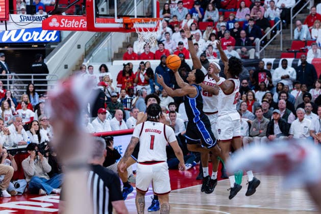 March 2, 2026, Raleigh, North Carolina, USA: Duke Blue Devils guard CALEB FOSTER (1) drives to the basket and goes up for a layup during the first half of the NCAA, College League, USA ACC menÃ¢â‚¬â ¢s basketball game between the Duke Blue Devils and the NC State Wolfpack at the Lenovo Center in Raleigh, North Carolina. Raleigh USA - ZUMAa220 20260302_znp_a220_021 Copyright: xIsraelxAntax