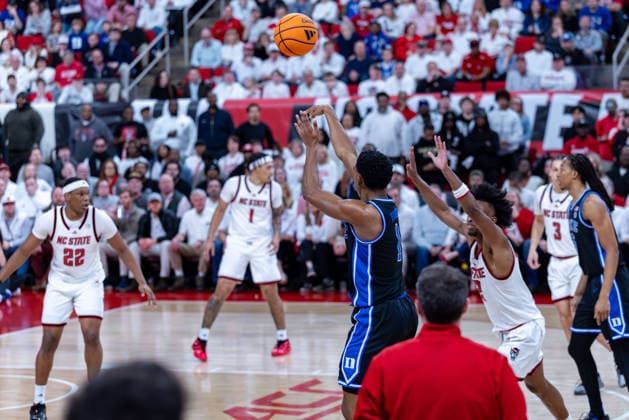 March 2, 2026, Raleigh, North Carolina, USA: Duke Blue Devils guard CALEB FOSTER (1) shoots a three pointer during the first half of the NCAA, College League, USA ACC menÃ¢â‚¬â ¢s basketball game between the Duke Blue Devils and the NC State Wolfpack at the Lenovo Center in Raleigh, North Carolina. Raleigh USA - ZUMAa220 20260302_znp_a220_033 Copyright: xIsraelxAntax