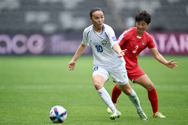 SOCCER ASIAN CUP NORTH KOREA UZBEKISTAN, Khabibullaeva Diyorakhon of Uzbekistan and Ri Myong Gum of North Korea during the AFC Women™s Asian Cup Group B match between North Korea and Uzbekistan at CommBank Stadium in Sydney, Tuesday, March 3, 2026. ( NO ARCHIVING, EDITORIAL USE ONLY SYDNEY NEW SOUTH WALES AUSTRALIA  Copyright: xDEANxLEWINSx 20260303188514362992