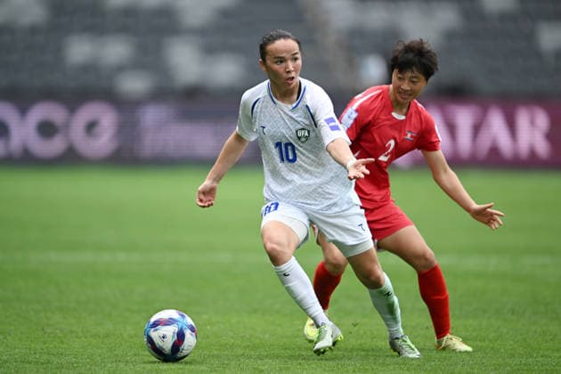 SOCCER ASIAN CUP NORTH KOREA UZBEKISTAN, Khabibullaeva Diyorakhon of Uzbekistan and Ri Myong Gum of North Korea during the AFC Women™s Asian Cup Group B match between North Korea and Uzbekistan at CommBank Stadium in Sydney, Tuesday, March 3, 2026. ( NO ARCHIVING, EDITORIAL USE ONLY SYDNEY NEW SOUTH WALES AUSTRALIA  Copyright: xDEANxLEWINSx 20260303134663755810