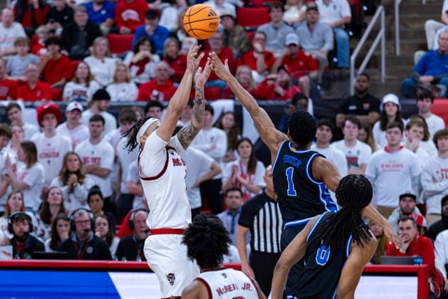 March 2, 2026, Raleigh, North Carolina, USA: NC State Wolfpack forward DARRION WILLIAMS (1) shoots a jump shot over Duke Blue Devils guard CALEB FOSTER (1) during the second half of the NCAA, College League, USA ACC menÃ¢â‚¬â ¢s basketball game between the Duke Blue Devils and the NC State Wolfpack at the Lenovo Center in Raleigh, North Carolina. Raleigh USA - ZUMAa220 20260302_znp_a220_061 Copyright: xIsraelxAntax