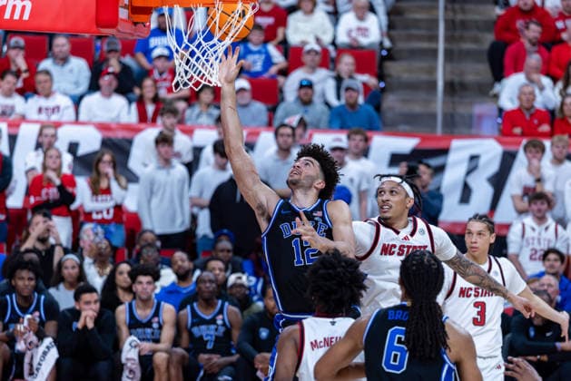 March 2, 2026, Raleigh, North Carolina, USA: Duke Blue Devils forward CAMERON BOOZER (12) drives to the basket and goes up for the layup around NC State Wolfpack forward DARRION WILLIAMS (1) during the second half of the NCAA, College League, USA ACC menÃ¢â‚¬â ¢s basketball game between the Duke Blue Devils and the NC State Wolfpack at the Lenovo Center in Raleigh, North Carolina. Raleigh USA - ZUMAa220 20260302_znp_a220_065 Copyright: xIsraelxAntax
