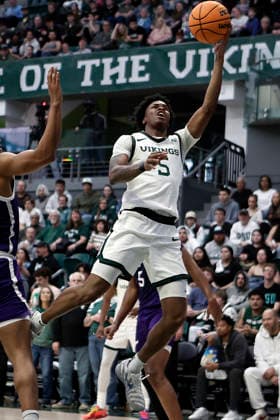 March 02, 2026: Portland State Vikings guard Jaylin Henderson (5) puts in a layup that added to Vikings 84-60 win over the visiting Weber State Bobcats to win the Big Sky Championship at the Stott Center, Portland, OR. CSM (Cal Media via AP Images) Portland USA - ZUMAc04_ 20260302_zma_c04_004 Copyright: xLarryxC.xLawsonx