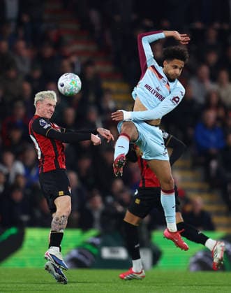 Bournemouth, England, 3rd March 2026. Ãlex JimÃ nez of Bournemouth and Kevin Schade of Brentford challenge for the ball during the AFC Bournemouth vs Brentford Premier League match at the Vitality Stadium, Bournemouth. Picture credit should read: Paul Terry Sportimage EDITORIAL USE ONLY. No use with unauthorised audio, video, data, fixture lists, club league logos or live services. Online in-match use limited to 120 images, no video emulation. No use in betting, games or single club league player publications. SPI_010_PT_Bournemouth_Brentford SPI-4572-0010