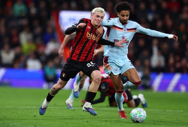 Bournemouth, England, 3rd March 2026. Ãlex JimÃ nez of Bournemouth and Kevin Schade of Brentford challenge for the ball during the AFC Bournemouth vs Brentford Premier League match at the Vitality Stadium, Bournemouth. Picture credit should read: Paul Terry Sportimage EDITORIAL USE ONLY. No use with unauthorised audio, video, data, fixture lists, club league logos or live services. Online in-match use limited to 120 images, no video emulation. No use in betting, games or single club league player publications. SPI_013_PT_Bournemouth_Brentford SPI-4572-0013