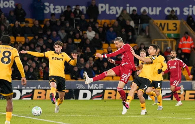 Wolverhampton, England, 3rd March 2026. Hugo Ekitike of Liverpool shoots during the Wolverhampton Wanderers vs Liverpool Premier League match at Molineux, Wolverhampton. Picture credit should read: Andrew Yates Sportimage EDITORIAL USE ONLY. No use with unauthorised audio, video, data, fixture lists, club league logos or live services. Online in-match use limited to 120 images, no video emulation. No use in betting, games or single club league player publications. SPI_050_AY_Wolves_Liverpool SPI-4574-0044