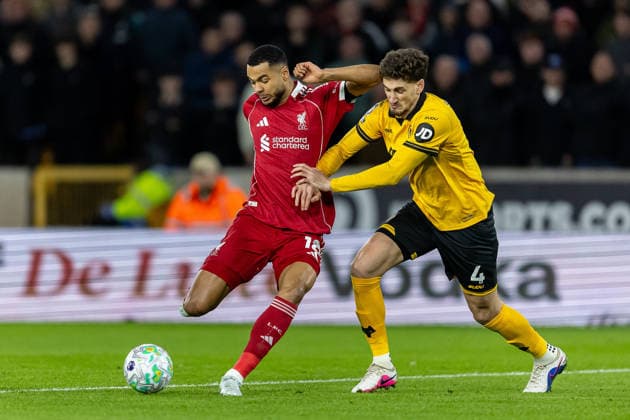 Wolverhampton Wanderers v Liverpool, Premier League Liverpool forward Cody Gakpo (18) battles for possession with Wolverhampton Wanderers defender Santiago Bueno (4) during the Premier League match between Wolverhampton Wanderers and Liverpool at Molineux, Wolverhampton, UK on 3 March 2026. Wolverhampton Molineux West Midlands UK Editorial use only DataCo restrictions apply See www.football-dataco.com , Copyright: xManjitxNarotrax PSI-23833-0014