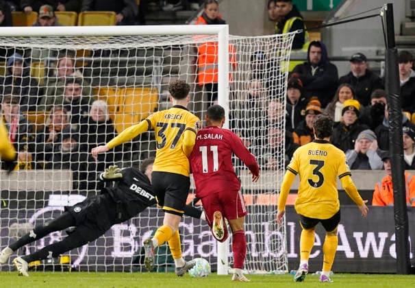 Wolverhampton, England, 3rd March 2026. Mohamed Salah of Liverpool equalises (1-1) during the Wolverhampton Wanderers vs Liverpool Premier League match at Molineux, Wolverhampton. Picture credit should read: Andrew Yates Sportimage EDITORIAL USE ONLY. No use with unauthorised audio, video, data, fixture lists, club league logos or live services. Online in-match use limited to 120 images, no video emulation. No use in betting, games or single club league player publications. SPI_075_AY_Wolves_Liverpool SPI-4574-0071