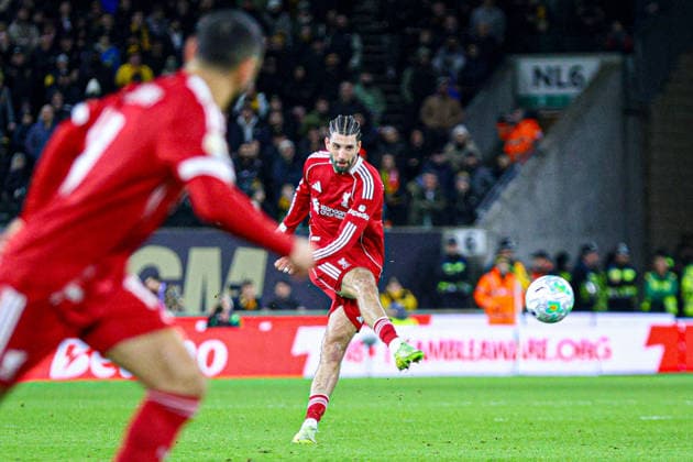 WOLVERHAMPTON, ENGLAND - March 03: Dominik Szoboszlai of Liverpool strikes the ball during the Premier League football match between Wolverhampton Wanderers and Liverpool at Molineux stadium on March 03, 2026 in Wolverhampton, England. (Photo by Natalie Mincher Sports Press Photo) Copyright: xNataliexMincher SPPx Sportspressphoto_SPR101101
