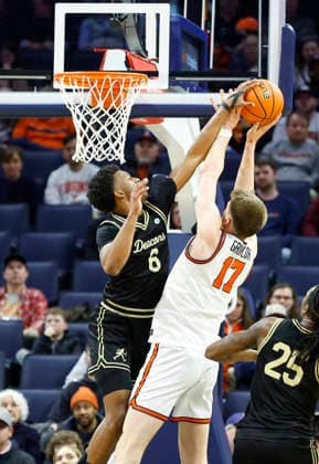 NCAA, College League, USA Basketball 2026: Wake Forest Vs UVA MAR 03 March 03, 2026: Wake Forest Demon Deacons Guard 6 Myles Colvin fouls Virginia Cavaliers Center 17 Johann Grunloh under the basket during a NCAA Men s Basketball game between the Wake Forest Demon Deacons and the University of Virginia Cavaliers at John Paul Jones Arena in Charlottesville, VA. Justin Cooper CSM (Credit Image: Â Justin Cooper Cal Media) Charlottesville Virginia United States of America EDITORIAL USE ONLY Copyright: xx ZUMA-20260303_zma_c04_022.jpg JustinxCooperx csmphotothree477201