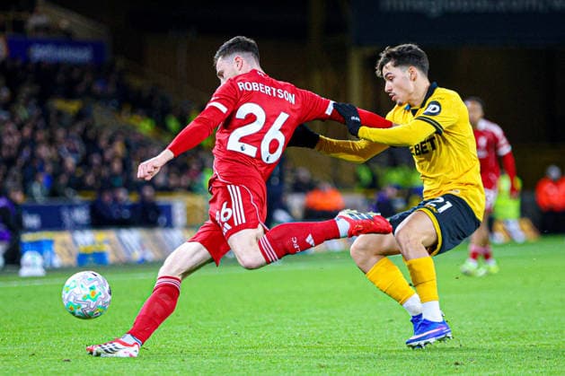 WOLVERHAMPTON, ENGLAND - March 03: Andy Robertson of Liverpool clears the ball during the Premier League football match between Wolverhampton Wanderers and Liverpool at Molineux stadium on March 03, 2026 in Wolverhampton, England. (Photo by Natalie Mincher Sports Press Photo) Copyright: xNataliexMincher SPPx Sportspressphoto_SPR101156