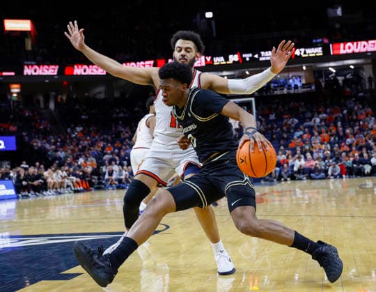 March 03, 2026: Wake Forest Demon Deacons Guard 6 Myles Colvin dribbles to the hoop guarded by Virginia Cavaliers Forward 11 Devin Tillis during a NCAA, College League, USA Men s Basketball game between the Wake Forest Demon Deacons and the University of Virginia Cavaliers at John Paul Jones Arena in Charlottesville, VA. CSM Charlottesville United States of America - ZUMAc04_ 20260303_zma_c04_043 Copyright: xJustinxCooperx