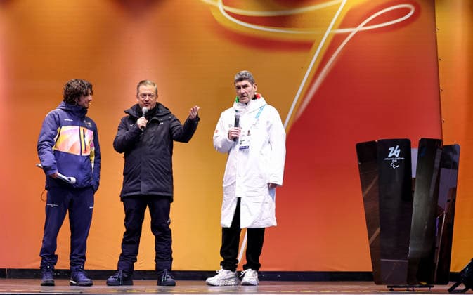 (260304) -- CORTINA D AMPEZZO, March 4, 2026 -- Andrew Parsons (C), president of International Paralympic Committee (IPC) delivers a speech during the Milan-Cortina 2026 Paralympic Winter games, Winterspiele,Spiele, Summer games Torch Relay and Flame Unifying Ceremony in Cortina D Ampezzo, Italy, March 3, 2026. ) (SP)ITALY-CORTINA D AMPEZZO-PARALYMPIC WINTER GAMES-FLAME UNIFYING CEREMONY WangxKaiyan 