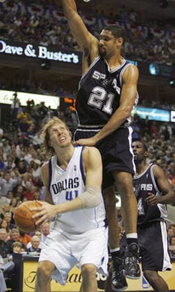May 19, 2006; Dallas, TX, USA; Spurs Tim Duncan defends Mavericks Dirk Nowitzki during first quarter action at the America Airlines Center in Dallas, TX Friday May 19, 2006 game six of the NBA, Basketball Herren, USA Western Conference semifinals.Duncan was called with his second foul on the play. Mandatory Credit: Photo by Jerry Lara ZUMA Press. ( ) Copyright 2006 by San Antonio Express-News Dallas TX USA Copyright: xJerryxLarax