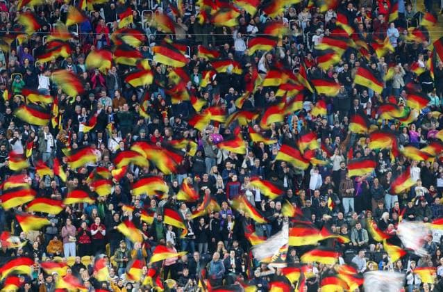 GER, Fussball, Frauen, WM Qualifikation, Deutschland - Slowenien 03.03.2026, Dresden, Rudolf-Harbig-Stadion, GER, WM Qualifikation, Frauen-Laenderspiel, Gruppenphase, Gruppe D, Spiel 1 von 6 Deutschland - Slowenien im Bild: Fans schwenken Deutschland-Fahnen, ein Meer in schwarz rot gold DFL regulations prohibit any use of photographs as image sequences and or quasi-video *** GER, Football, Women, World Cup Qualification, Germany Slovenia 03 03 2026, Dresden, Rudolf Harbig Stadium, GER, World Cup Qualification, Women Country Match, Group Phase, Group D, Match 1 of 6 Germany Slovenia in picture Fans waving Germany flags, a sea in black red gold DFL regulations prohibit any use of photographs as image sequences and or quasi video