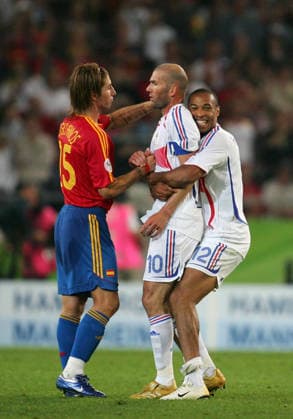Jun 27, 2006; Hannover, Germany; FIFA World Cup, WM, Weltmeisterschaft, Fussball 2006 : Garcia Sergio Ramos of Spain gets consoled by Zinedine Zidane of France with Thierry Henry hugging the French captain at the end of the game Mandatory Credit: Photo by Matthew Ashton KEYSTONE Press. ( ) Copyright 2006 by Matthew Ashton Hannover Germany Copyright: xMatthewxAshtonx