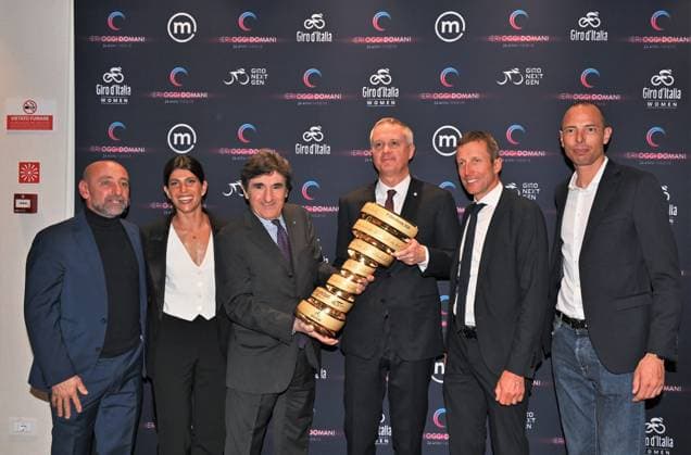 Milan, Italy GIRO D ITALIA 2026 institutional presentation with Banca Mediolanum at the Mediolanum headquarters. In the photo: Massimo Antonio Doris, CEO, MD & Director of Banca Mediolanum SpA and President of Snow Peak SRL, Urbano Cairo, president of Cairo Communication, RCS MediaGroup and Torino Calcio with the GIRO D ITALIA 2026 cup and Bettini Paolo, Motta Giovanni, Ballan Alessandro Maurizio Fondriest, Dalia Muccioli  Copyright: xNickxZonnax xipa-agency.netx xNickxZonnax IPA_Agency_IPA72372969
