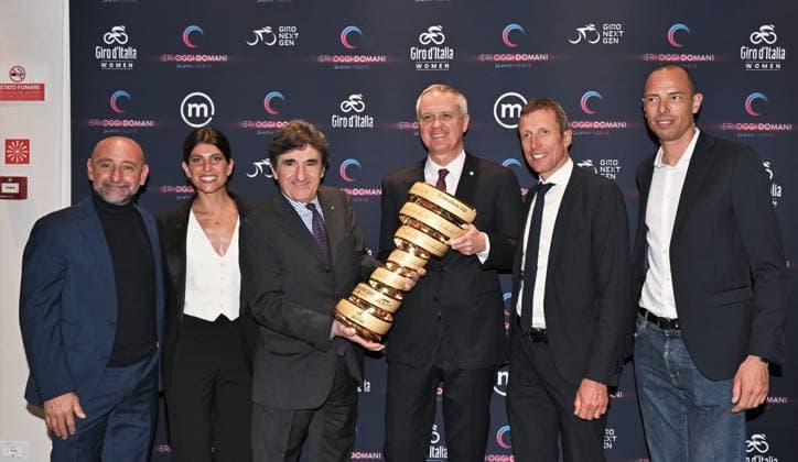 Milan, Italy GIRO D ITALIA 2026 institutional presentation with Banca Mediolanum at the Mediolanum headquarters. In the photo: Massimo Antonio Doris, CEO, MD & Director of Banca Mediolanum SpA and President of Snow Peak SRL, Urbano Cairo, president of Cairo Communication, RCS MediaGroup and Torino Calcio with the GIRO D ITALIA 2026 cup and Bettini Paolo, Motta Giovanni, Ballan Alessandro Maurizio Fondriest, Dalia Muccioli  Copyright: xNickxZonnax xipa-agency.netx xNickxZonnax IPA_Agency_IPA72372973