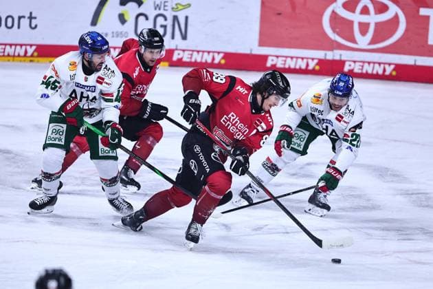 Gregor MacLeod (Koelner Haie, 89) im Zweikampf mit Cody Kunyk (Augsburg Panther, 20, rechts), inks: Jason Bast (Augsburg Panther, 45) GER, Koelner Haie vs Augsburg Panther, Eishockey, Penny DEL, 49. Spieltag, Spielzeit 2025 2026, 04.03.2026 GER, Koelner Haie vs Augsburg Panther, Eishockey, Penny DEL, 49. Spieltag, Spielzeit 2025 2026, 04.03.2026 Koeln *** Gregor MacLeod Koelner Haie, 89 in duel with Cody Kunyk Augsburg Panther, 20, right , inks Jason Bast Augsburg Panther, 45 GER, Koelner Haie vs Augsburg Panther, Ice Hockey, Penny DEL, 49 Spieltag, Spielzeit 2025 2026, 04 03 2026 GER, Koelner Haie vs Augsburg Panther, Ice Hockey, Penny DEL, 49 Spieltag, Spielzeit 2025 2026, 04 03 2026 Koeln Copyright: xEibner-Pressefoto RenexWeissx EP_RWS