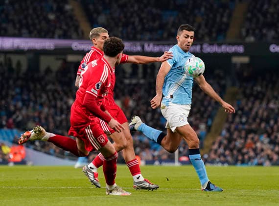 Manchester, England, 4th March 2026. Nicolas Dominguez of Nottingham Forest and Rodri of Manchester City during the Manchester City vs Nottingham Forest Premier League match at the Etihad Stadium, Manchester. Picture credit should read: Andrew Yates Sportimage EDITORIAL USE ONLY. No use with unauthorised audio, video, data, fixture lists, club league logos or live services. Online in-match use limited to 120 images, no video emulation. No use in betting, games or single club league player publications. SPI_026_AY_Manchester_City_Forest SPI-4576-0025