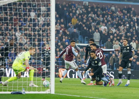 Birmingham, England, 4th March 2026. Douglas Luiz of Aston Villa scores their sides first goal during the Aston Villa vs Chelsea Premier League match at Villa Park, Birmingham. Picture credit should read: Cody Froggatt Sportimage EDITORIAL USE ONLY. No use with unauthorised audio, video, data, fixture lists, club league logos or live services. Online in-match use limited to 120 images, no video emulation. No use in betting, games or single club league player publications. SPI_017_CF_ASTON_VILLA_V_CHELSEA SPI-4577-0018
