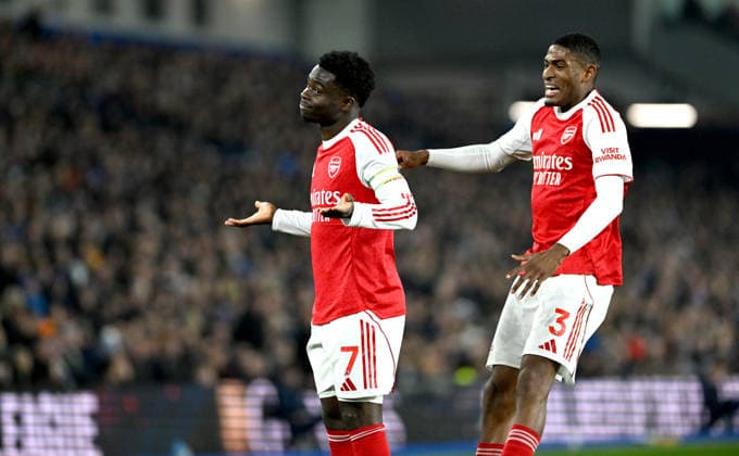 Bukayo Saka of Arsenal on the left celebrates scoring the opening goal with Christian Mosquera during the Premier League match between Brighton and Hove Albion and Arsenal at the American Express Stadium , Brighton , UK - 4th March 2026 Brighton & Hove Albion vs Arsenal Premier League Football, Amex Stadium, Sussex, United Kingdom - 04 Mar 2026Brighton Amex Stadium Sussex United Kingdom Editorial use only. No merchandising. For Football images FA and Premier League restrictions apply inc. no internet mobile usage without FAPL license - for details contact Football Dataco  Copyright: xSimonxDack TPI Shutterstockx 16724173k