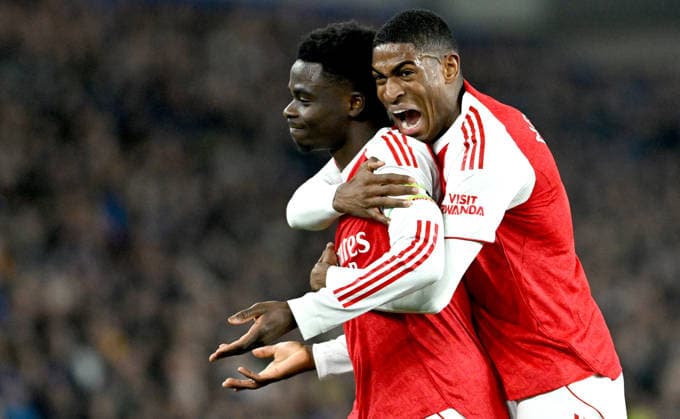 Bukayo Saka of Arsenal on the left celebrates scoring the opening goal with Christian Mosquera during the Premier League match between Brighton and Hove Albion and Arsenal at the American Express Stadium , Brighton , UK - 4th March 2026 Brighton & Hove Albion vs Arsenal Premier League Football, Amex Stadium, Sussex, United Kingdom - 04 Mar 2026Brighton Amex Stadium Sussex United Kingdom Editorial use only. No merchandising. For Football images FA and Premier League restrictions apply inc. no internet mobile usage without FAPL license - for details contact Football Dataco  Copyright: xSimonxDack TPI Shutterstockx 16724173l