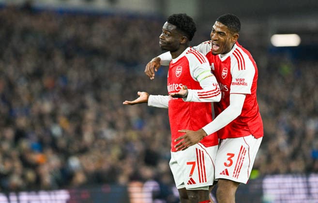 Bukayo Saka of Arsenal on the left celebrates scoring the opening goal with Christian Mosquera during the Premier League match between Brighton and Hove Albion and Arsenal at the American Express Stadium , Brighton , UK - 4th March 2026 Brighton & Hove Albion vs Arsenal Premier League Football, Amex Stadium, Sussex, United Kingdom - 04 Mar 2026Brighton Amex Stadium Sussex United Kingdom Editorial use only. No merchandising. For Football images FA and Premier League restrictions apply inc. no internet mobile usage without FAPL license - for details contact Football Dataco  Copyright: xSimonxDack TPI Shutterstockx 16724173m