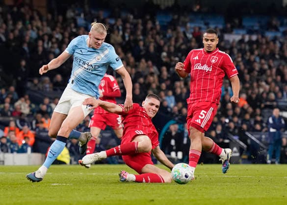 Manchester, England, 4th March 2026. Nikola Milenkovic of Nottingham Forest intercepts Erling Haaland of Manchester City during the Manchester City vs Nottingham Forest Premier League match at the Etihad Stadium, Manchester. Picture credit should read: Andrew Yates Sportimage EDITORIAL USE ONLY. No use with unauthorised audio, video, data, fixture lists, club league logos or live services. Online in-match use limited to 120 images, no video emulation. No use in betting, games or single club league player publications. SPI_037_AY_Manchester_City_Forest SPI-4576-0036