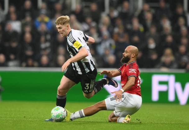 Bryan Mbeumo of Manchester United, ManU slides in with a challenge on Lewis Hall of Newcastle United Newcastle United v Manchester United, Premier League, Football, St James Park, Newcastle, UK - 04 Mar 2026Newcastle St James Park United Kingdom EDITORIAL USE ONLY No use with unauthorised audio, video, data, fixture lists, club league logos or live services. Online in-match use limited to 120 images, no video emulation. No use in betting, games or single club league player publications. Copyright: xRichardxLee Shutterstockx 16723964aa