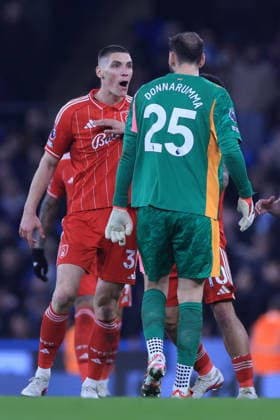 Manchester City v Nottingham Forest - Premier League Nikola Milenkovic of Nottingham Forest and Gianluigi Donnarumma, goalkeeper of Manchester City in incident during the Premier League match between Manchester City and Nottingham Forest at Etihad Stadium on March 4, 2026 in Manchester, England. WARNING! This Photograph May Only Be Used For Newspaper And Or Magazine Editorial Purposes. May Not Be Used For Publications Involving 1 player, 1 Club Or 1 Competition Without Written Authorisation From Football DataCo Ltd. For Any Queries, Please Contact Football DataCo Ltd on +44 (0) 207 864 9121 Manchester Etihad Stadium England United Kingdom Copyright: xAllstarxPicturexLibraryxLtdx