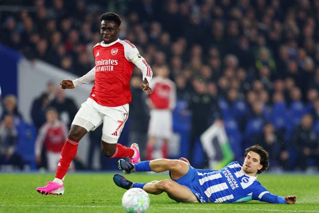 Brighton and Hove, England, 4th March 2026. Bukayo Saka of Arsenal and Ferdi Kadioglu of Brighton and Hove Albion challenge for the ball during the Brighton and Hove Albion vs Arsenal Premier League match at the AMEX Stadium, Brighton and Hove. Picture credit should read: Paul Terry Sportimage EDITORIAL USE ONLY. No use with unauthorised audio, video, data, fixture lists, club league logos or live services. Online in-match use limited to 120 images, no video emulation. No use in betting, games or single club league player publications. SPI_032_PT_Brighton_Arsenal SPI-4579-0032