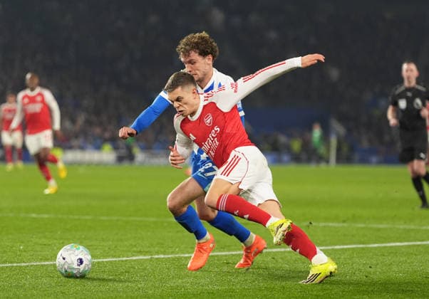 Brighton and Hove Albion v Arsenal, Premier League, Football, Amex Stadium, Brighton, UK - 04 Mar 2026 Mats Wieffer of Brighton and Leandro Trossard of Arsenal. Brighton Amex Stadium Brighton UK, UK NEWSPAPERS OUT Copyright: xSeanxRyanx