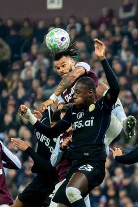 Aston Villa v Chelsea, Premier League Aston Villa defender Tyrone Mings (5) heads the ball during the Premier League match between Aston Villa and Chelsea at Villa Park, Birmingham, UK on 4 March 2026. Birmingham Villa Park West Midlands UK Editorial use only DataCo restrictions apply See www.football-dataco.com , Copyright: xManjitxNarotrax PSI-23838-0146